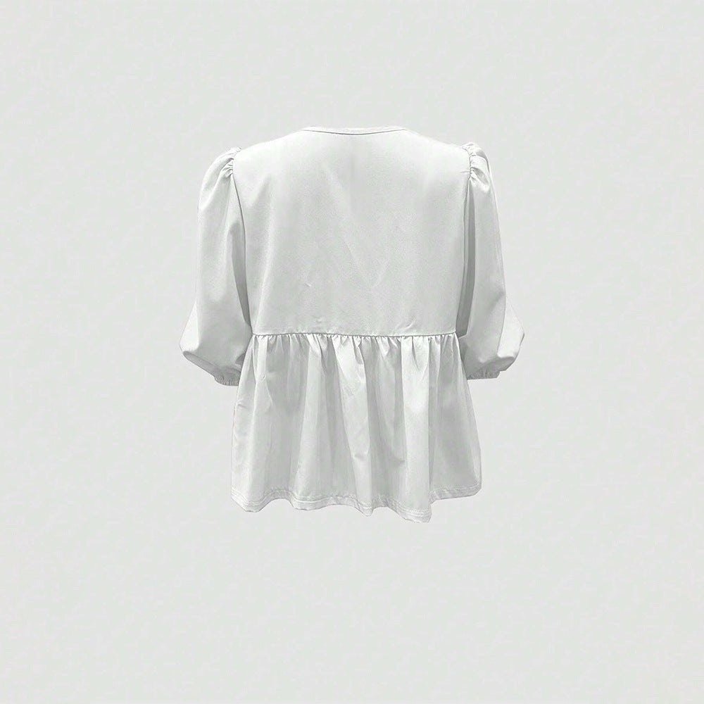 Feminine Bluse med Legende Rynkedetaljer og Afslappet Snit