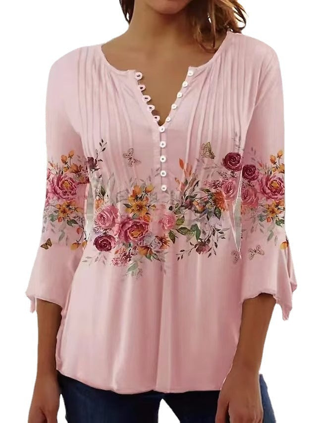 Elegant Blus med Blommigt Tryck och Knappsymfoni