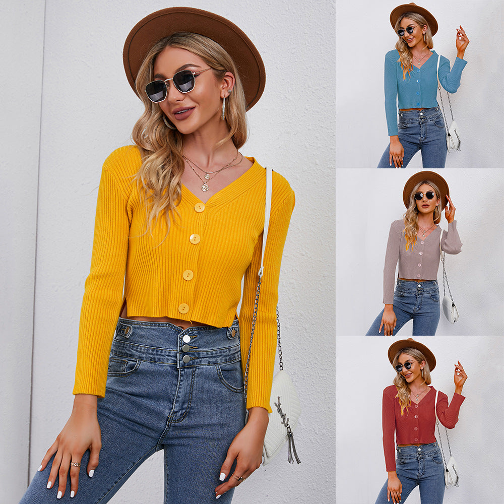 Stilfuld Cropped Strikjakke med Elegante Detaljer