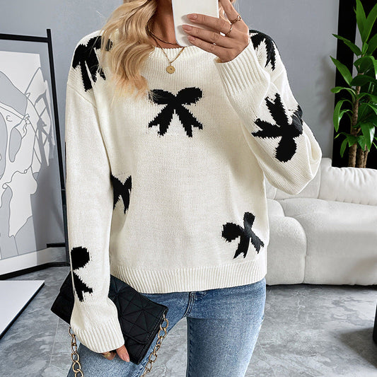 Feminint Strikket Pullover med Legende Sløjfedetaljer