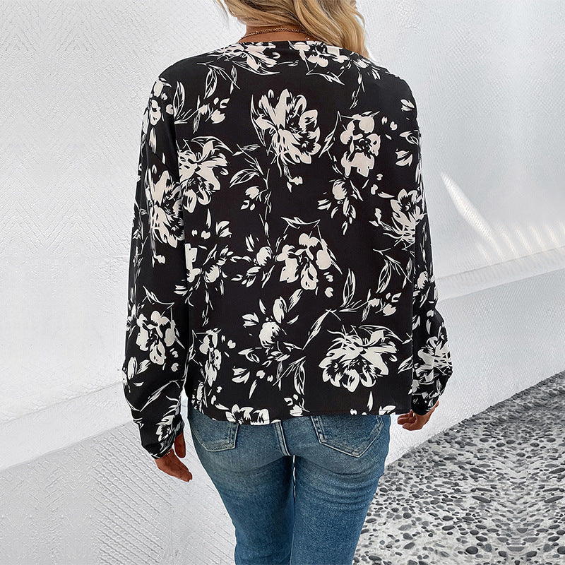 Blommönstrad blus med eleganta puffärmar från StilRamme