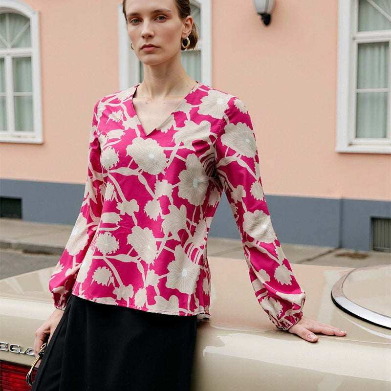 Elegant Bluse med Blomsterprint og Lækkert Draperet Stof