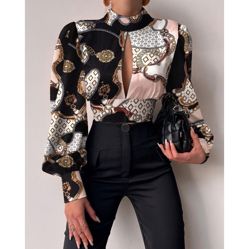Chic blus med nyckelhålsdetalj och voluminösa ärmar