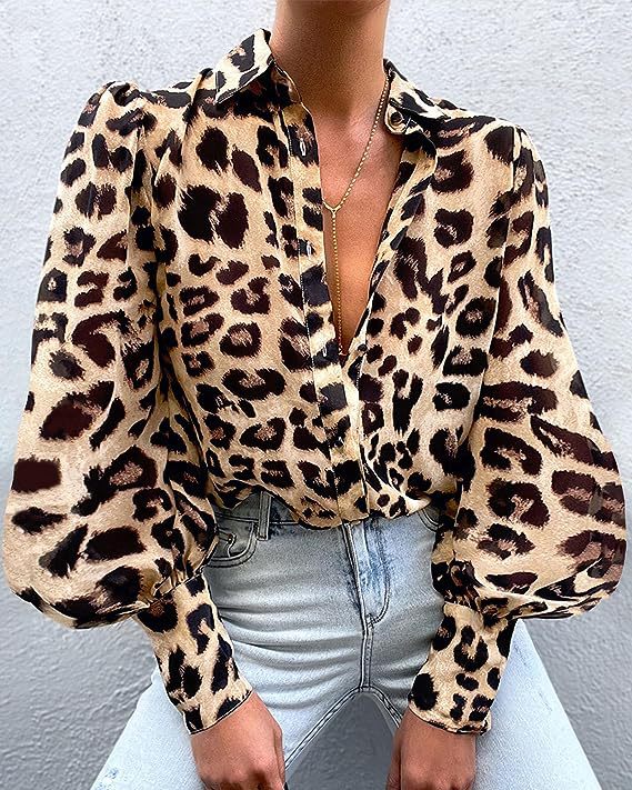 Elegant blus med djurtryck och lös silhuett