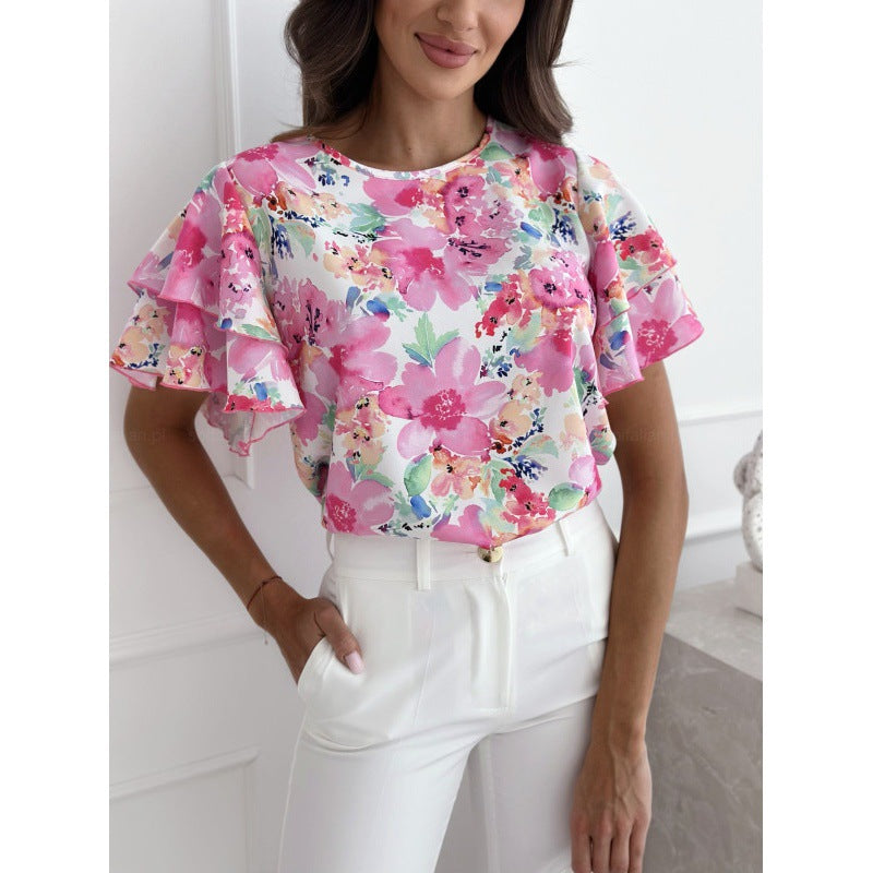 Blomsterprint Bluse med Flatterende Voluminøse Ærmer