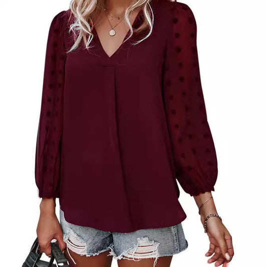 Elegant Blus med Transparenta Puffärmar och Prickig Design