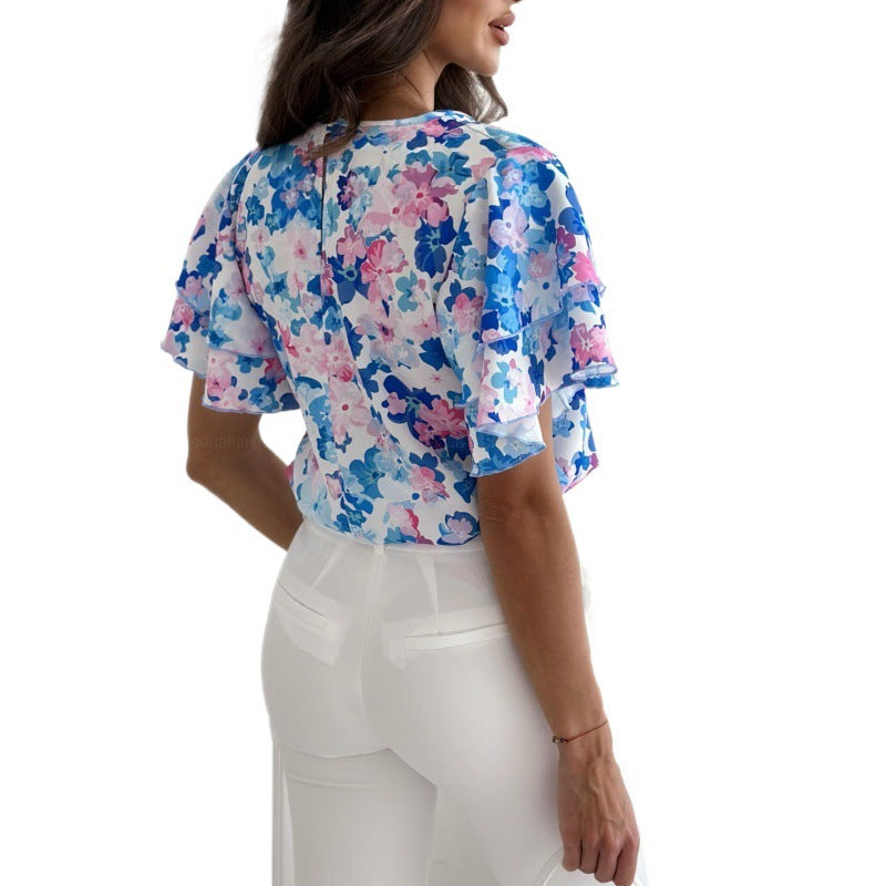 Blomsterprint Bluse med Flatterende Voluminøse Ærmer
