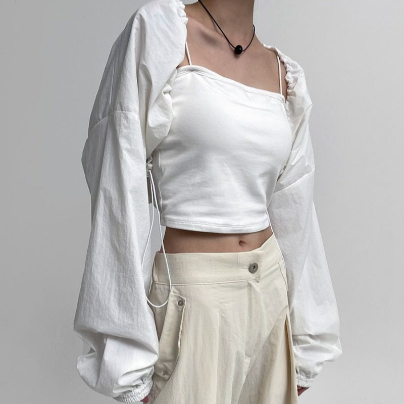 Elegant croppad blus med volanger för dam