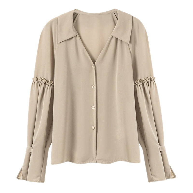 Feminine Bluse med Rynkedetaljer og V-Hals