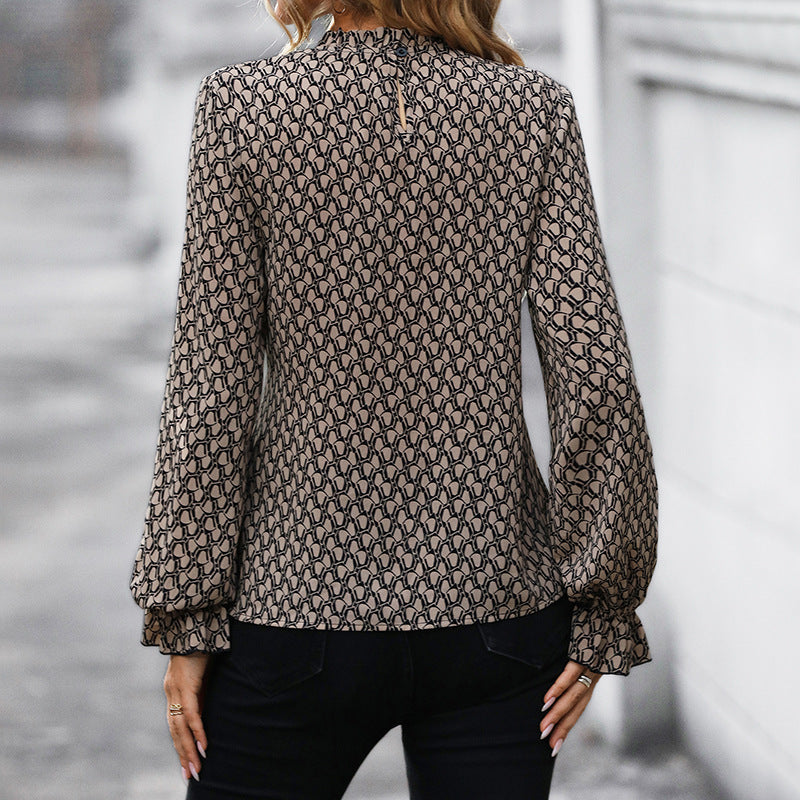 Chic blus med knytning och voluminösa ärmar