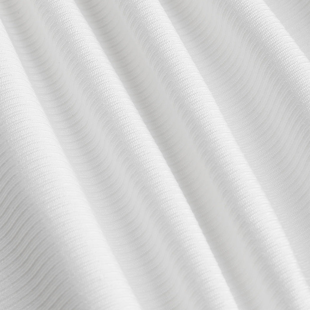 Stilfuld cropped langærmet bluse med elegant drapering