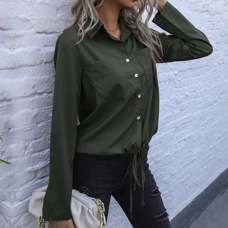 Moderne Bluse med Forkortet Front og Unikke Detaljer