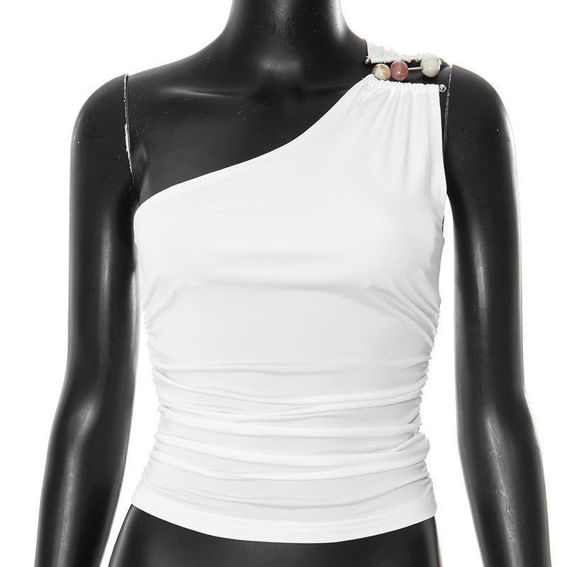 Asymmetrisk Top med Knappdetaljer och Figurformande Design
