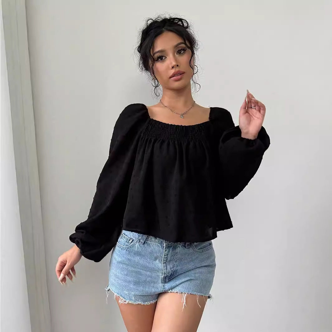 Sofistikerad Blus med Lätta Puffärmar och Strukturdesign