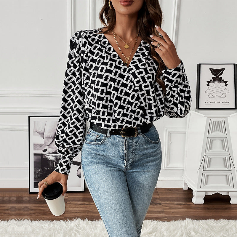 Geometrisk blus med eleganta puffärmar från StjerneMode