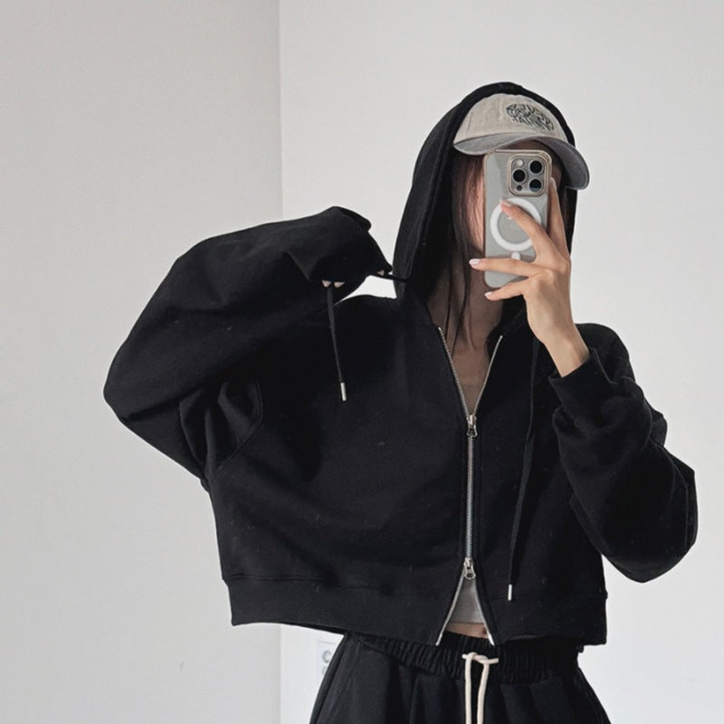 Modern cropped huvtröja för kvinnor med dragkedja och elastiska muddar