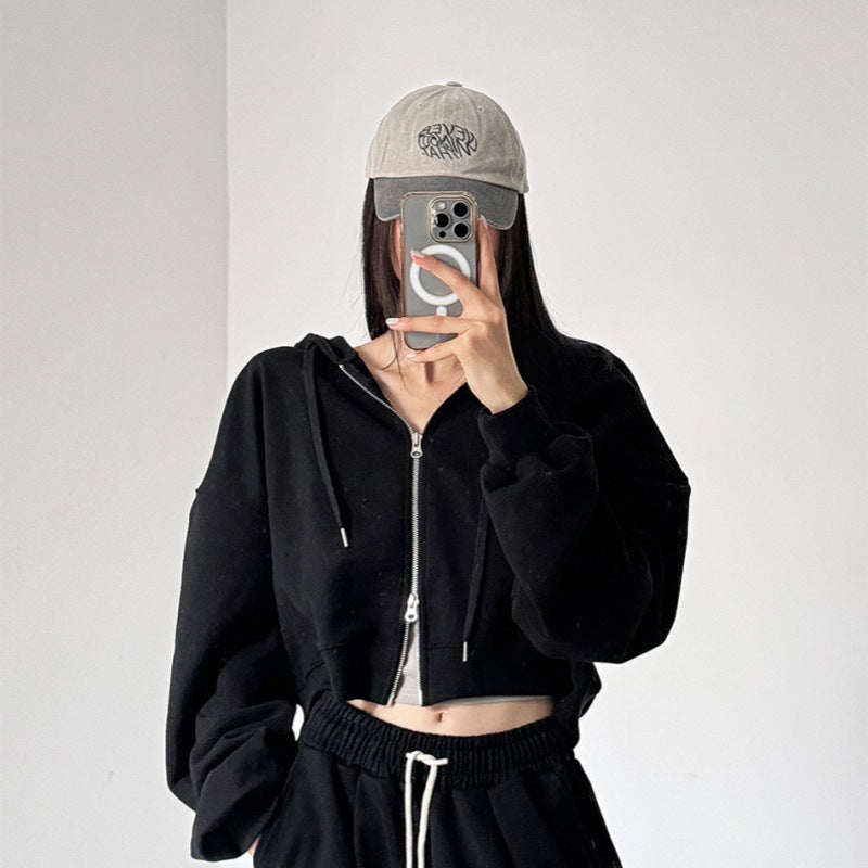 Modern cropped huvtröja för kvinnor med dragkedja och elastiska muddar