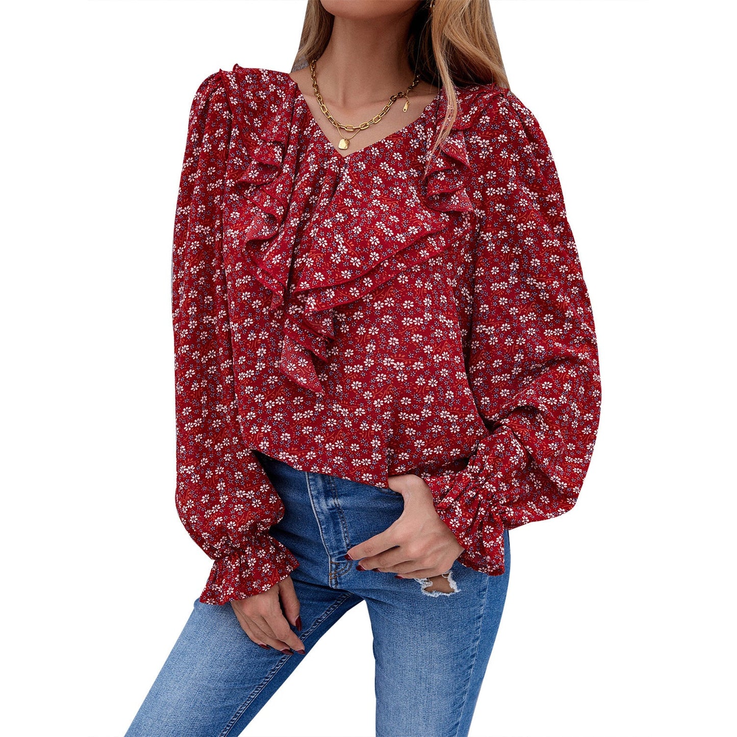 Elegant blus med smickrande detaljer och blomstertryck