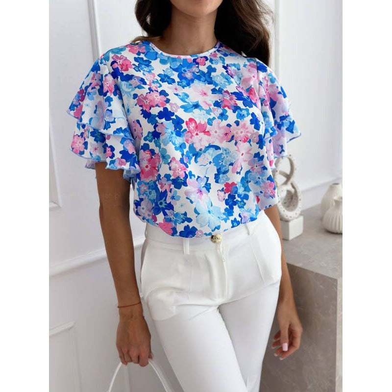 Blomsterprint Bluse med Flatterende Voluminøse Ærmer