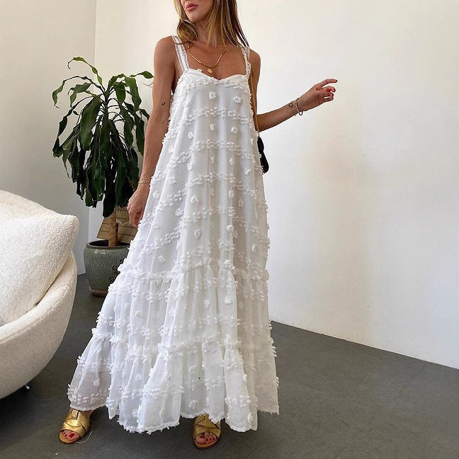 Elegant sommerkjole med volanger og blomsterprint