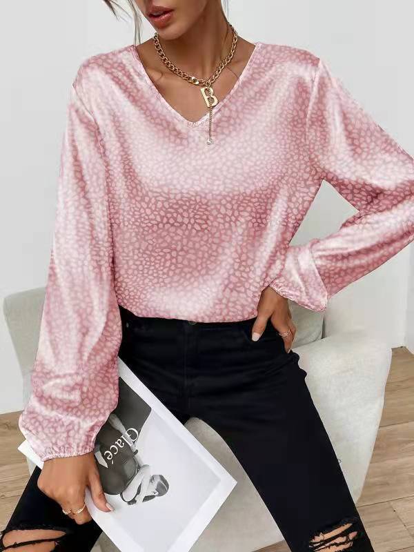 Moderne Bluse med V-Udskæring og Unikt Design