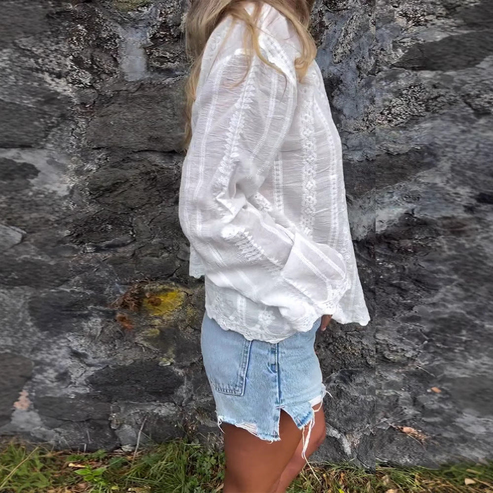 Elegant Bluse med Blomsterbroderi og Struktureret Design