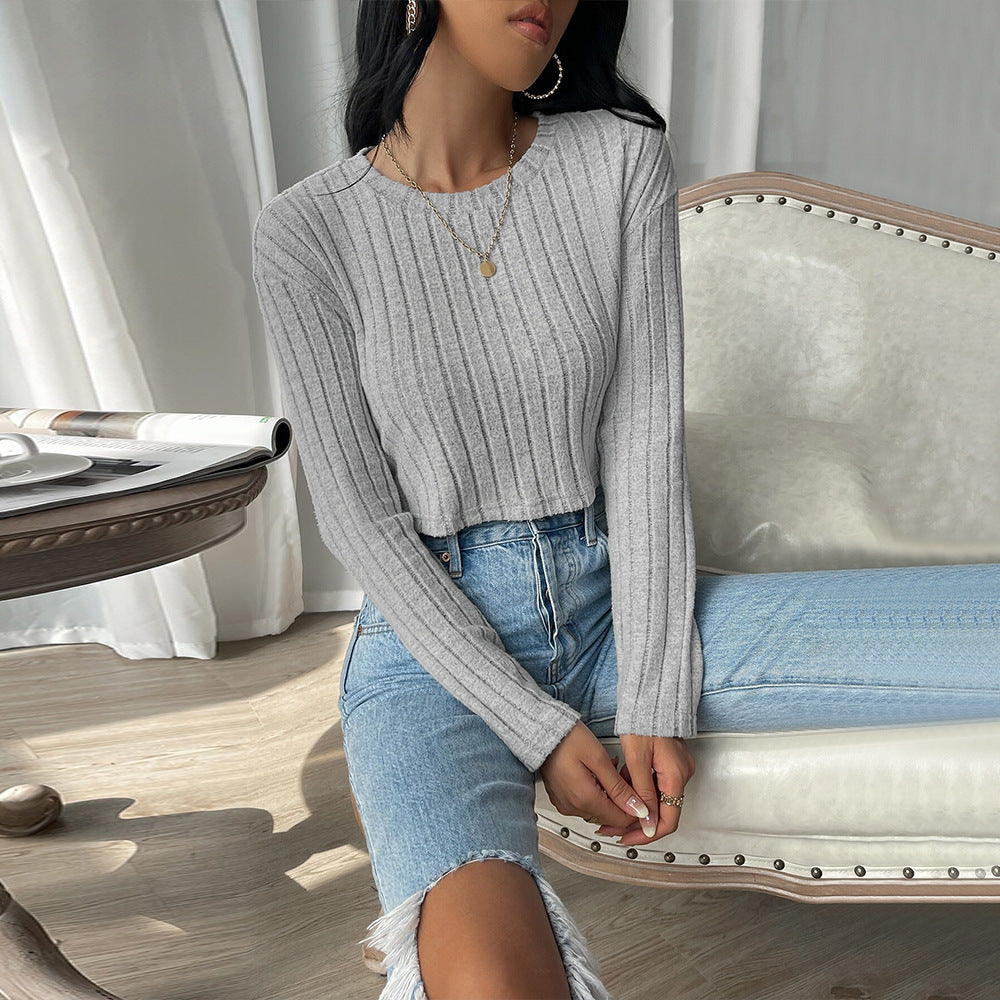 Stilfuld cropped pullover med let ribstruktur til kvinder