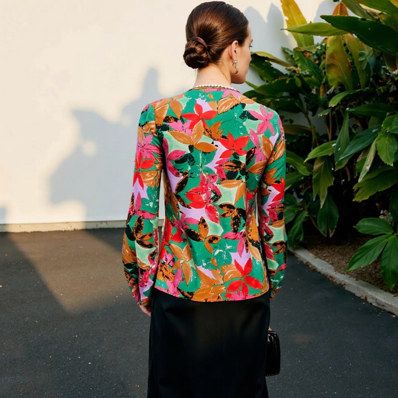 Elegant Bluse med Blomsterprint og Lækkert Draperet Stof