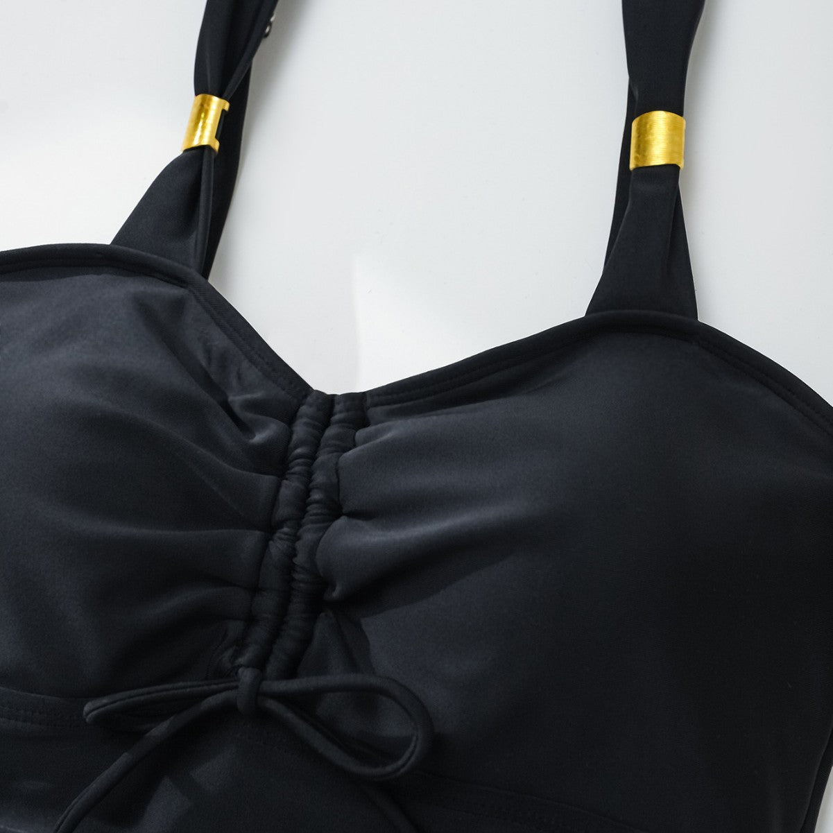 Stilren Baddräkt med Justerbara Remmar och Elegant Drapering