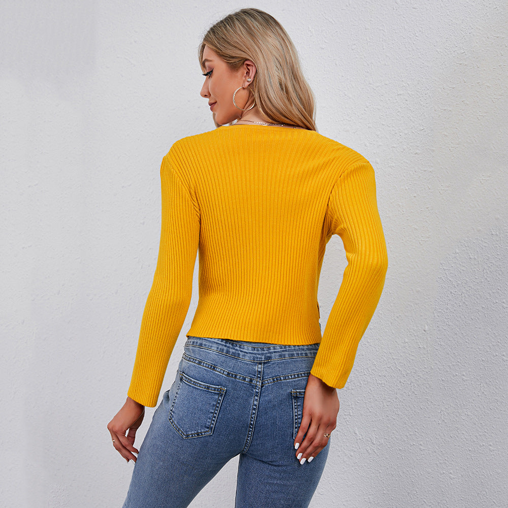 Stilfuld Cropped Strikjakke med Elegante Detaljer