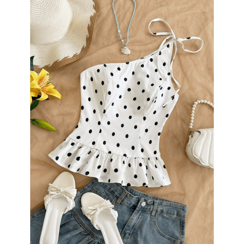 Elegant ärmlös blus med volangdetaljer för kvinnor