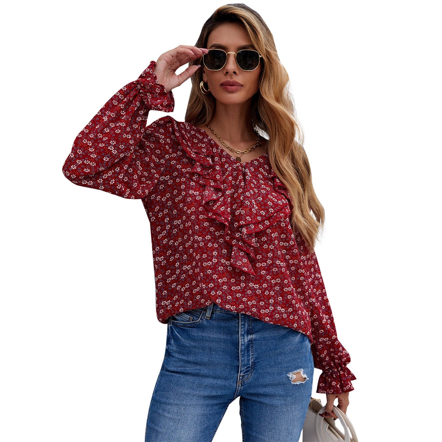 Elegant blus med smickrande detaljer och blomstertryck