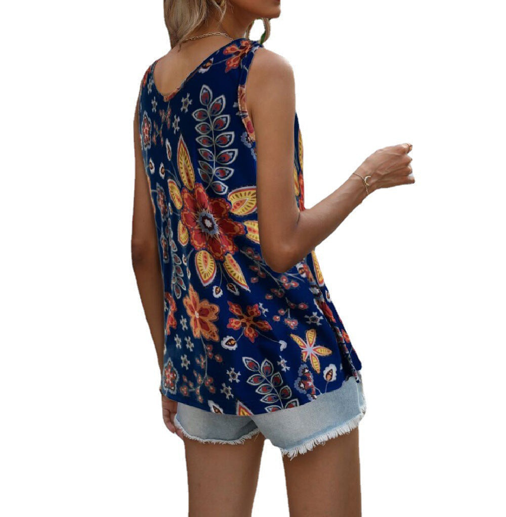 Feminint ärmlöst blus med blommig design och elegant drapering