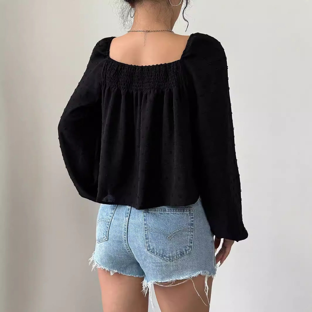 Sofistikerad Blus med Lätta Puffärmar och Strukturdesign