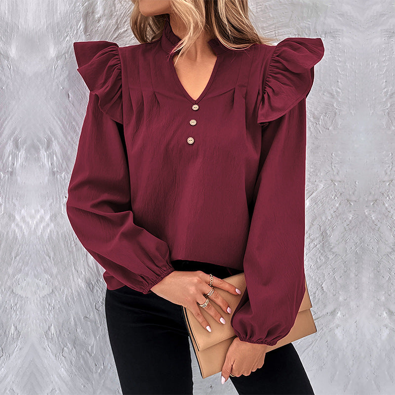 Feminine Bluse med Flatterærmer og Knapdetaljer