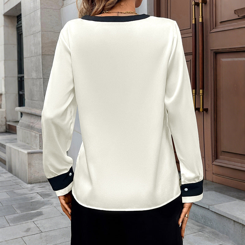 Stilfuld Bluse med Kontrasterende Krave og Knapper