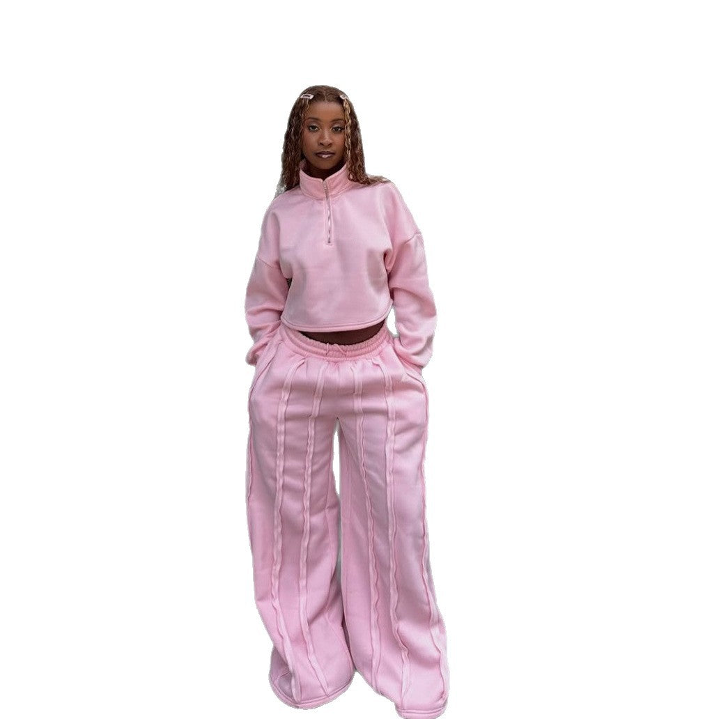 Stilfuldt cropped sæt med pullover og bukser
