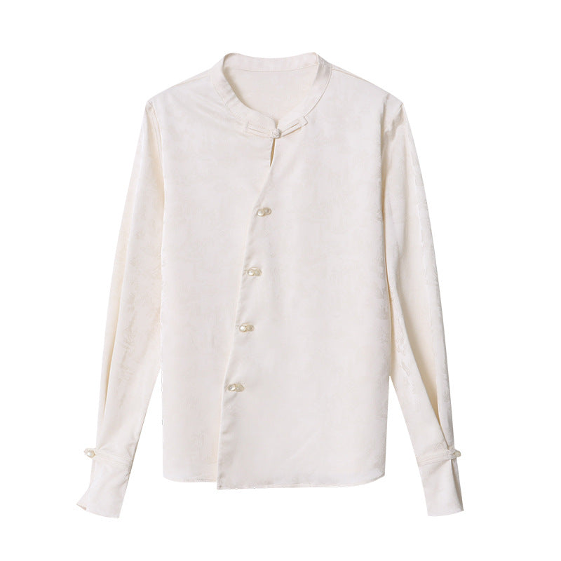 Stilfuld Bluse med Unikke Knapdetaljer og Fancy Krave