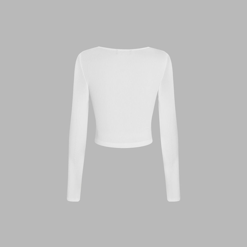 Stilfuld cropped langærmet bluse med elegant drapering
