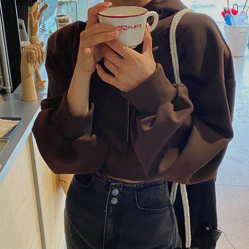Stilren croppad huvtröja med oversized passform
