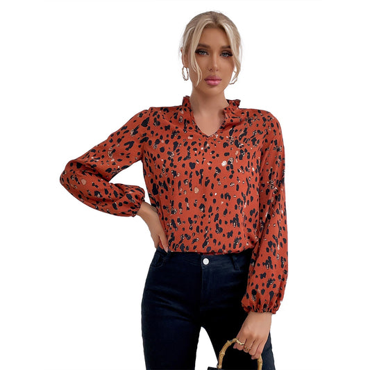 Elegant Bluse med Blomsterprint og Luftige Ærmer