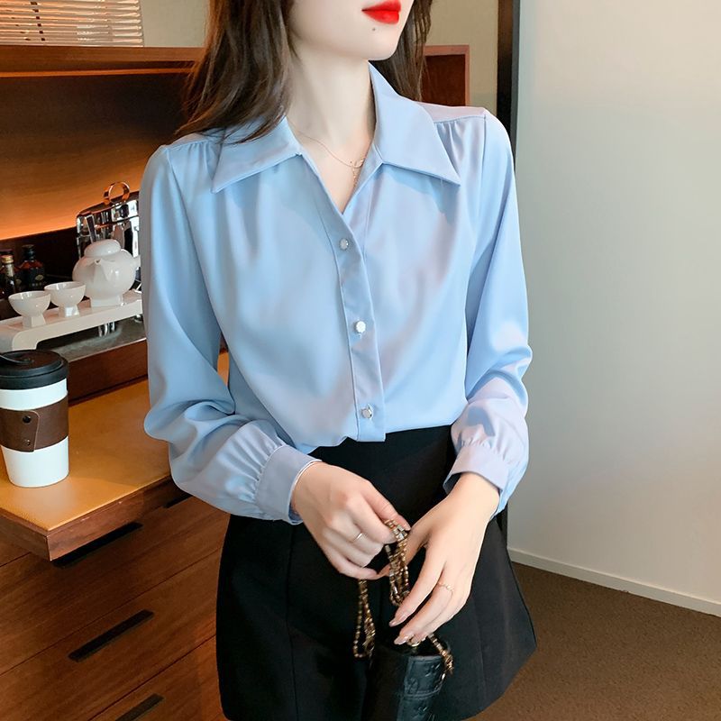 Klassisk Bluse med Elegante Detaljer
