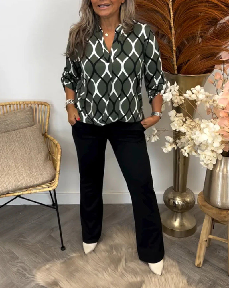 Elegante Bluse med grafisk design og praktiske lommer