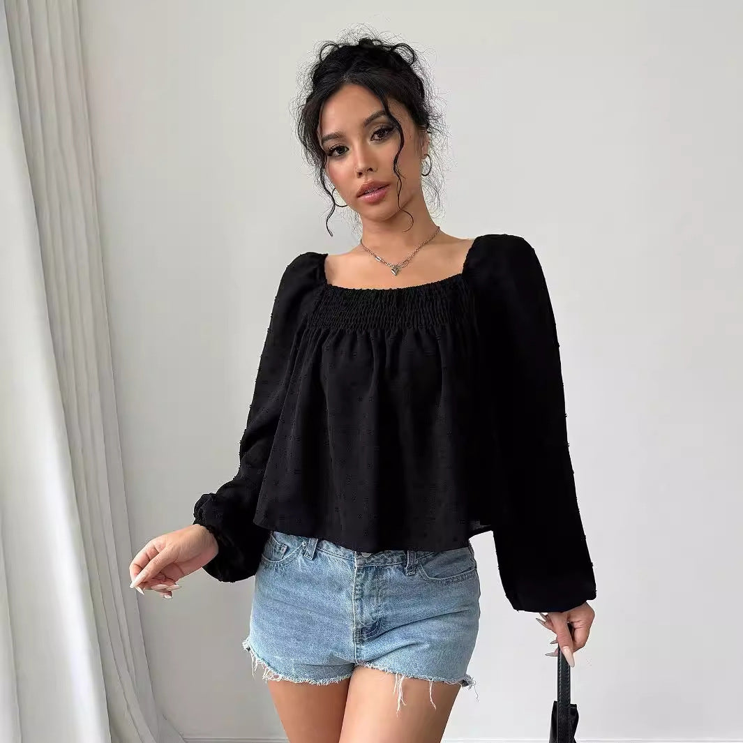 Sofistikerad Blus med Lätta Puffärmar och Strukturdesign