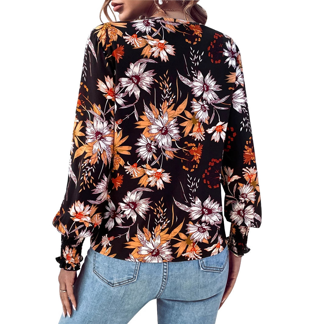 Blommig Blus med Elastiska Detaljer från StjerneStil