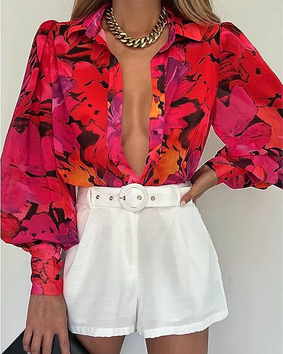 Elegant blus med djurtryck och lös silhuett