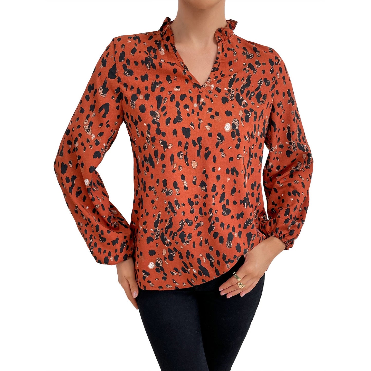 Elegant blus med blommigt tryck och luftiga ärmar