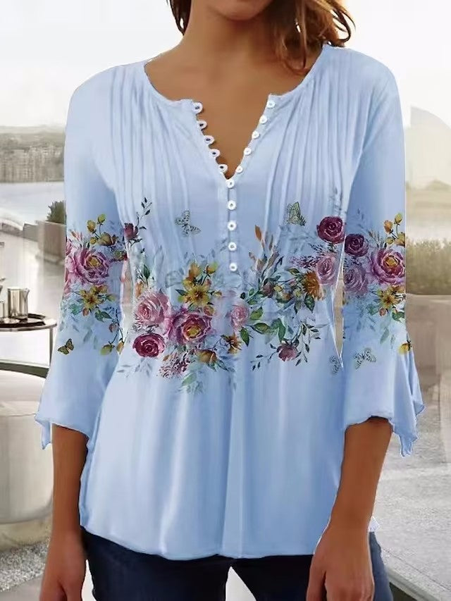 Elegant Blus med Blommigt Tryck och Knappsymfoni