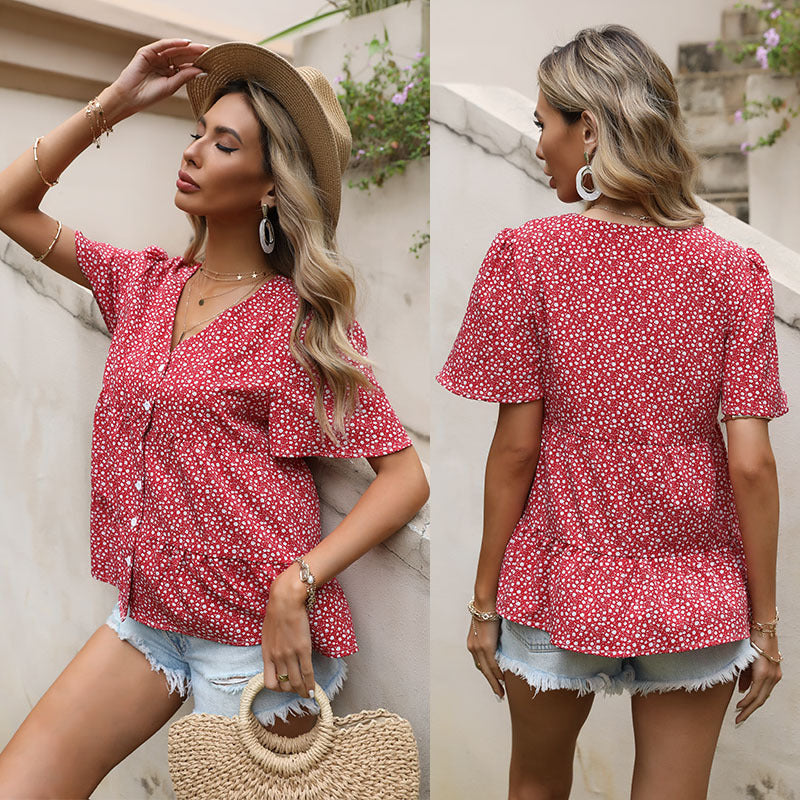 Elegant blus med smickrande detaljer och blomstertryck