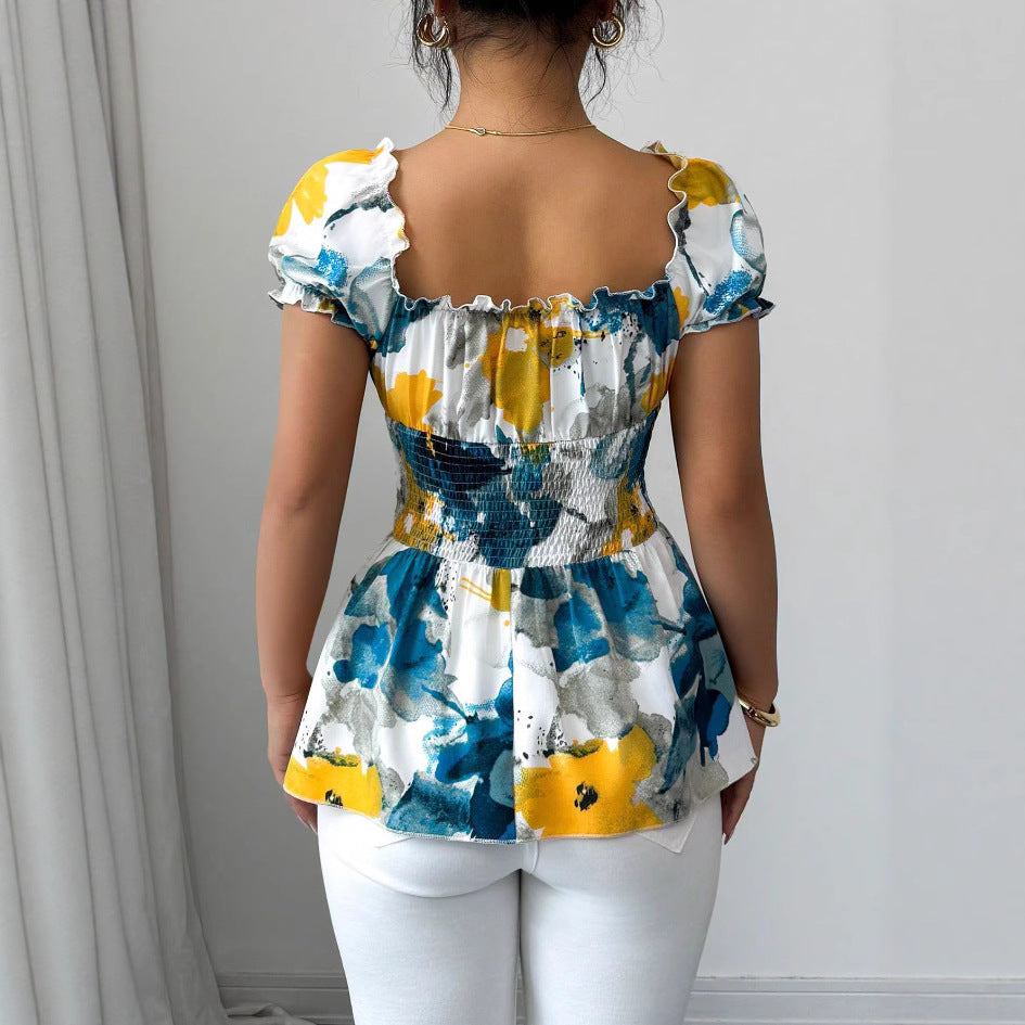Blus med blommönster och resår i midjan från StilFemme